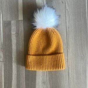 Anthropology hat with removable Pom Pom